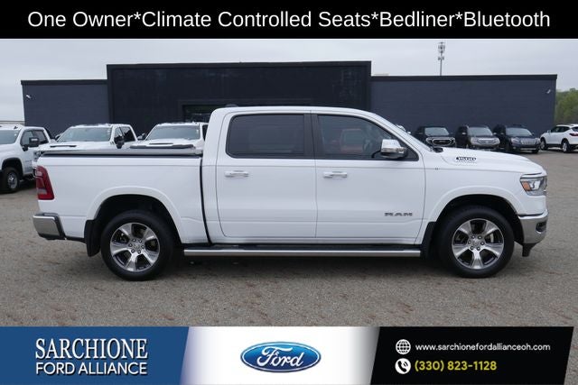 2021 RAM 1500 Laramie in Bright White Clearcoat — front three-quarter view
