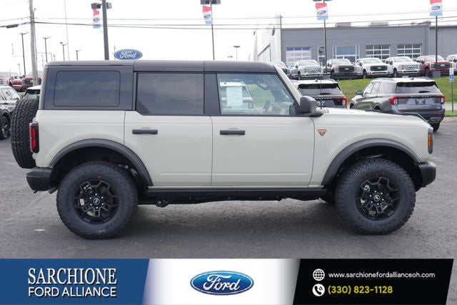 2026 Ford Bronco Badlands in Desert Sand — front three-quarter view