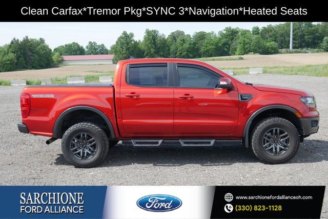2023 Ford Ranger Lariat in Hot Pepper Red Metallic Tinted Clearcoat — front three-quarter view