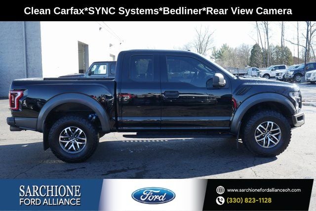 2018 Ford F-150 Raptor in Shadow Black — front three-quarter view