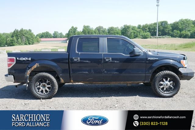 2013 Ford F-150 FX4 in Black — front three-quarter view