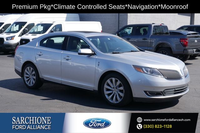 2013 Lincoln MKS Base in Silver Diamond Premium Coat Metallic — front three-quarter view